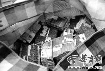 兩男子收到54萬賬款全為一元紙幣 重1140斤(圖)